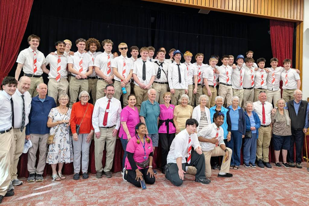 Members of the Surrey Beavers Athletic Association U18 team stand for a picture with residents and workers at Selwyn Village retirement community in Auckland, New Zealand, March 14. The players volunteered at Selwyn for an afternoon just as the Lord Tweedsmuir high school team had done in 2018. (Photo submitted to the Cloverdale Reporter/Walter van Halst)